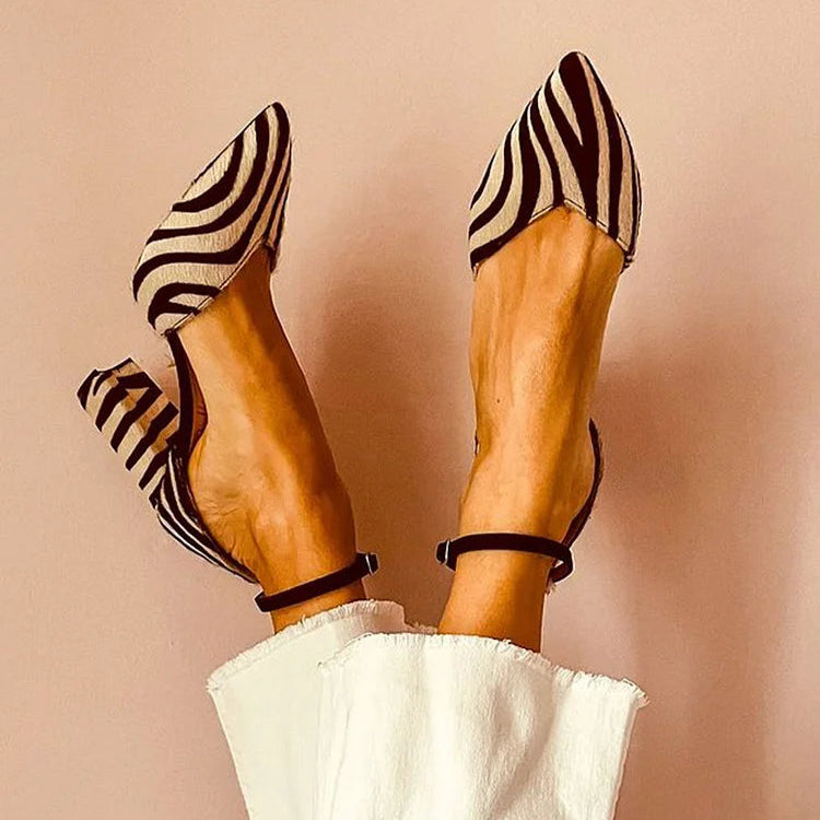 Zebra-print pointed toe pumps with ankle strap