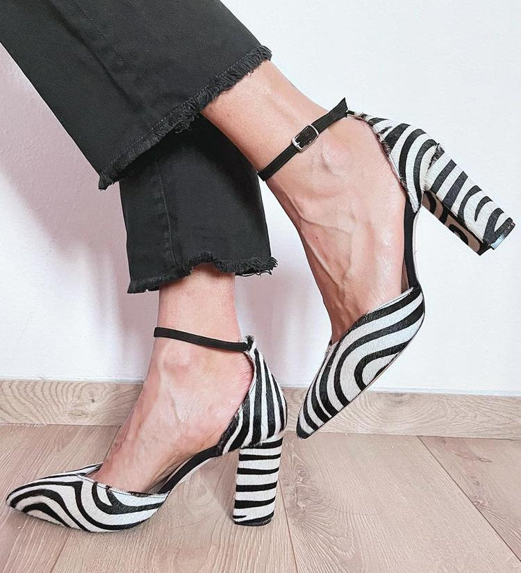 Zebra print pumps with ankle strap