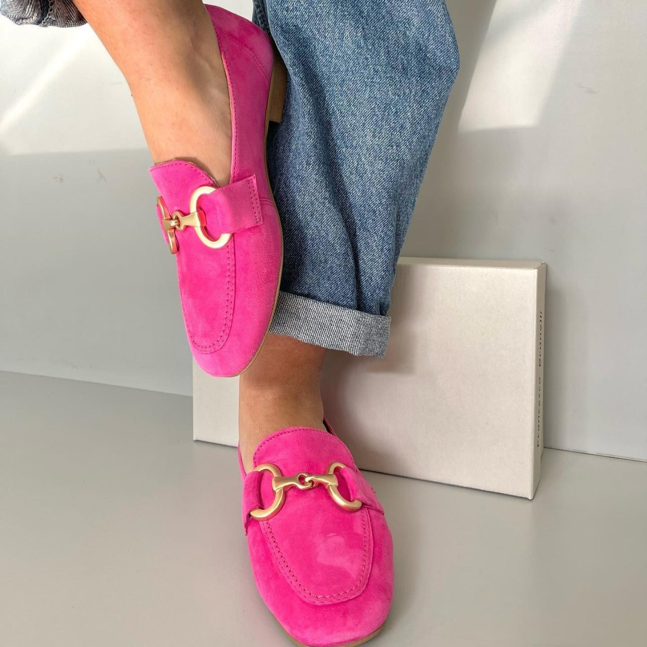 Chic loafers with gold detail